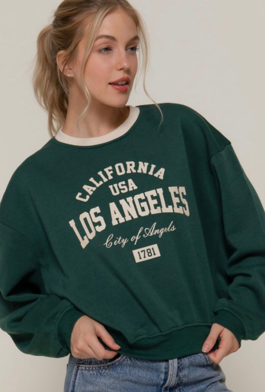 VARSITY SWEATERSHIRT